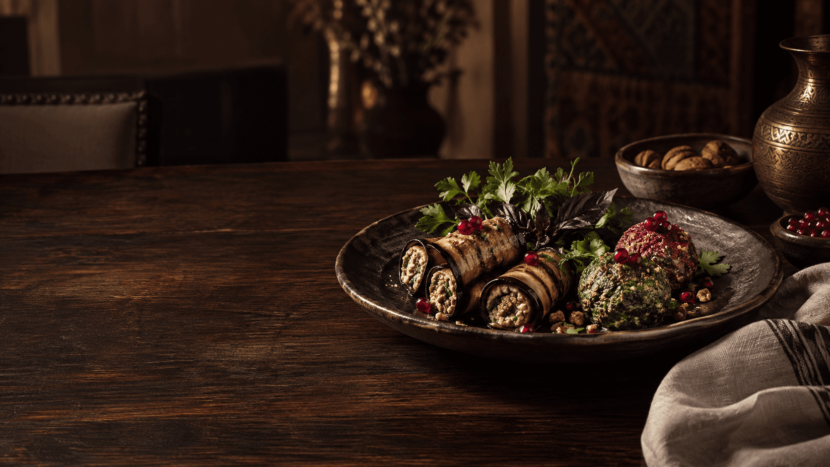 Georgian eggplant and walnut appetizers arranged on handmade ceramic